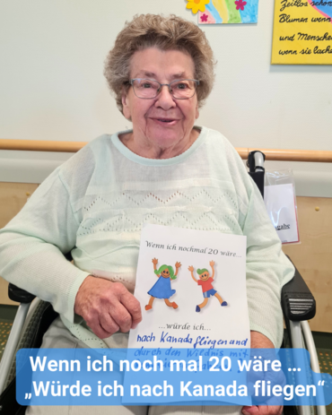Seniorin hält einen Zettel in die Kamera. Bildbeschriftung: Wenn ich noch mal 20 wäre … „Würde ich nach Kanada fliegen“