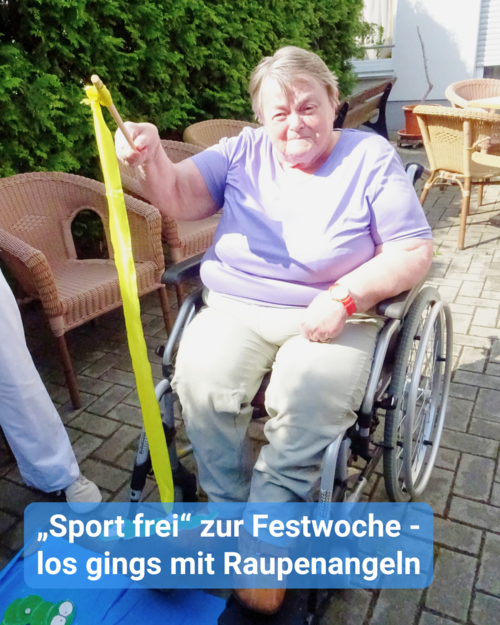Frau im Rollstuhl mit gelber Stange. Text: '„Sport frei“ zur Festwoche - los gings mit Raupenangeln'.